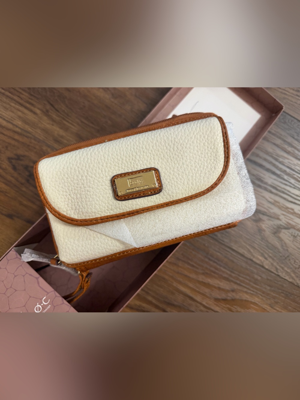 Pebbled Leather Ivory Wristlet Clutch with Tan Trim